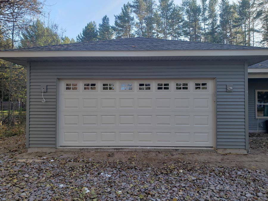 16 x 7 Desert tan garage door installation